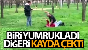 Biri yumrukladı diğeri kayda çekti