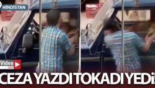 Maske takmadığı için ceza kesen polise tokat attı