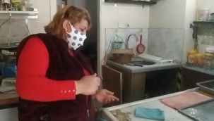 Kadın esnafın dükkanına giren hırsız çantayı çalıp kayıplara karıştı