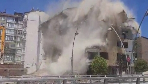 Ağır hasarlı bina korna sesi ile yıkıldı