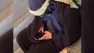 İphone'lu dilenci kameraya yakalandı