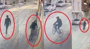 Elini kolunu sallayarak bisikleti çaldı
