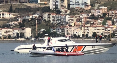 Denizde kaybolan kişiyi ararken silah buldular