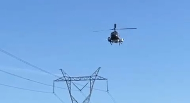 Yüksek gerilim hatları helikopterle temizlendi
