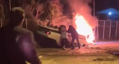 Takla atıp alev alan araçtan böyle kurtarıldı