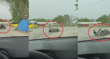 Motosikletiyle ön kaldırdı, kayarak yere düştü