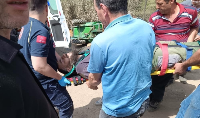 Traktörün altında kalan sürücü ölümden döndü