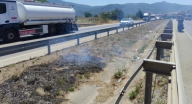 Araçtan atılan izmarit yangın çıkardı