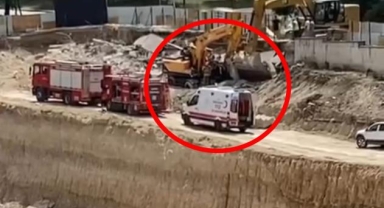 İstinat duvarı iş makinasının üzerine devrildi