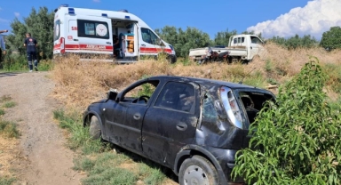 Kontrolünü kaybeden kadın sürücü tarlaya uçtu