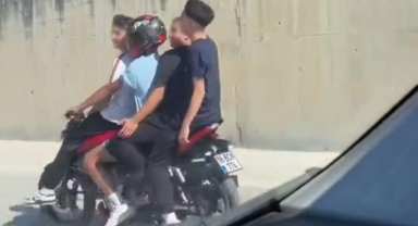 İki teker üstünde 4 kişi yolculuk yaptı