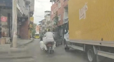 Motosiklete yüklediği eşyalar görenleri şaşkına çevirdi