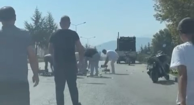 Dökülen armutları gören yardıma koştu