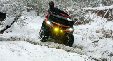 ATV tutkunlarının karda zorlu mücadelesi