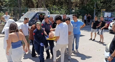 Yaralanan vatandaşı güneşten böyle korudular
