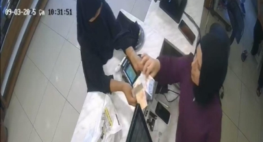 Bursa'da ‘yırtık para’ yöntemiyle tırnakçılık kamerada